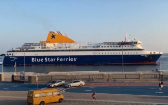 Blue star Ferries Myconos arrives at the port.